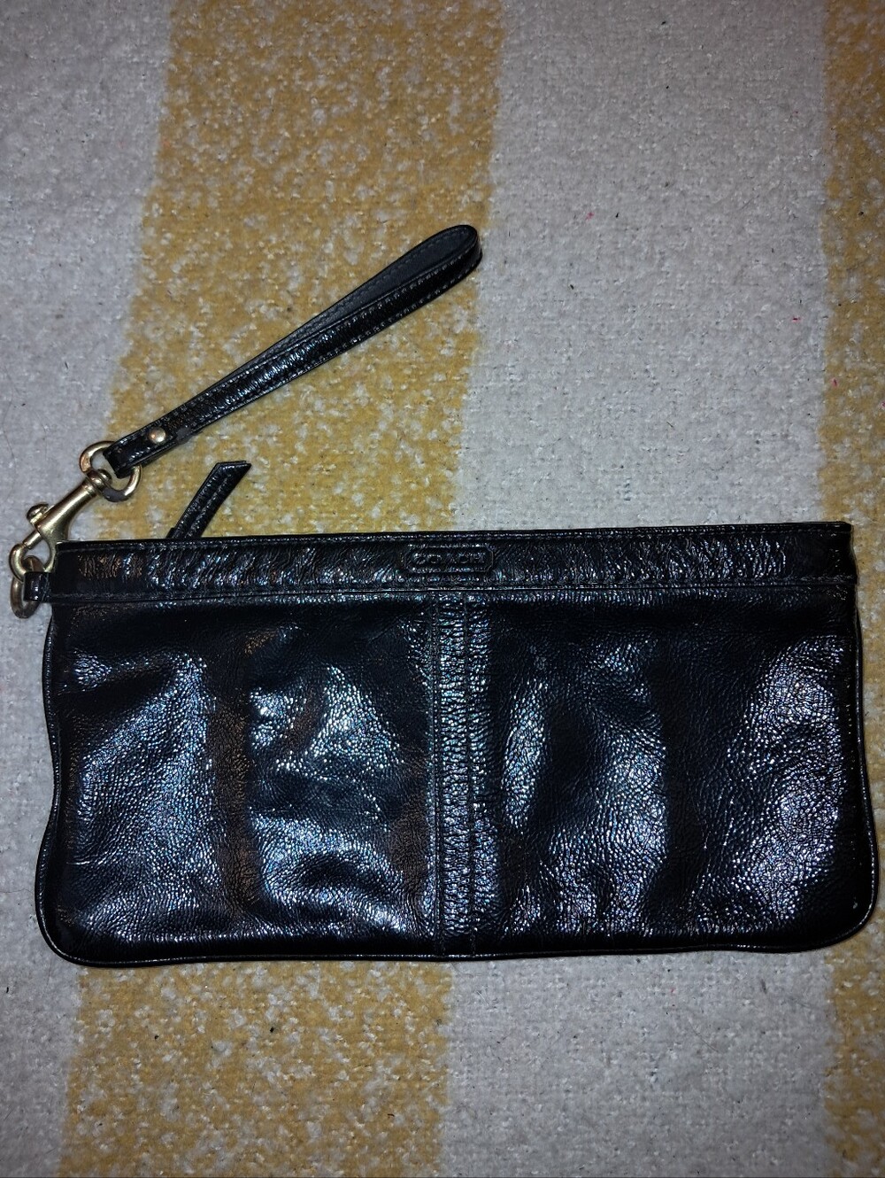 Coach brand Women's crinkled patent leather clutch wristlet